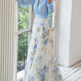 Tilde | Abito maxi con stampa floreale mozzafiato e scollo a V