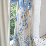 Tilde | Abito maxi con stampa floreale mozzafiato e scollo a V