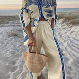 Gisella | Blusa oversize con stampa oceano stile isola e pantaloni con tasche elastiche