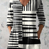Mona | Blusa lunga con scollo a V
