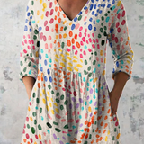 Ivonne | Blusa lunga con scollo a V