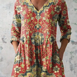 Trudi | Blusa lunga con scollo a V