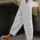 Clara | Pantaloni a righe con bottoni
