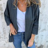 Cardigan in lino con volant — 11