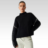 Alma | Maglia dolcevita oversize con dettagli in piqué — 1