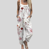 Salopette bianca con fiori rossi — 1