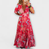 Marianne | Abito con tasche e scollo a V con motivo floreale — 1
