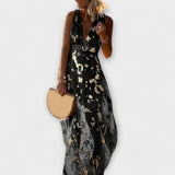Margaretha | Abito fluido con scollo a V e dettagli in paillettes — 10