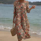 Nadine | Maxi abito con stampa floreale a girocollo — 1