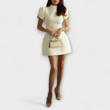 Bärbel | Miniabito con cut-out sul retro con fiocco e maniche corte — 2