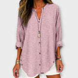 Kerstin | Elegante top con scollo a V e classico motivo a righe — 2