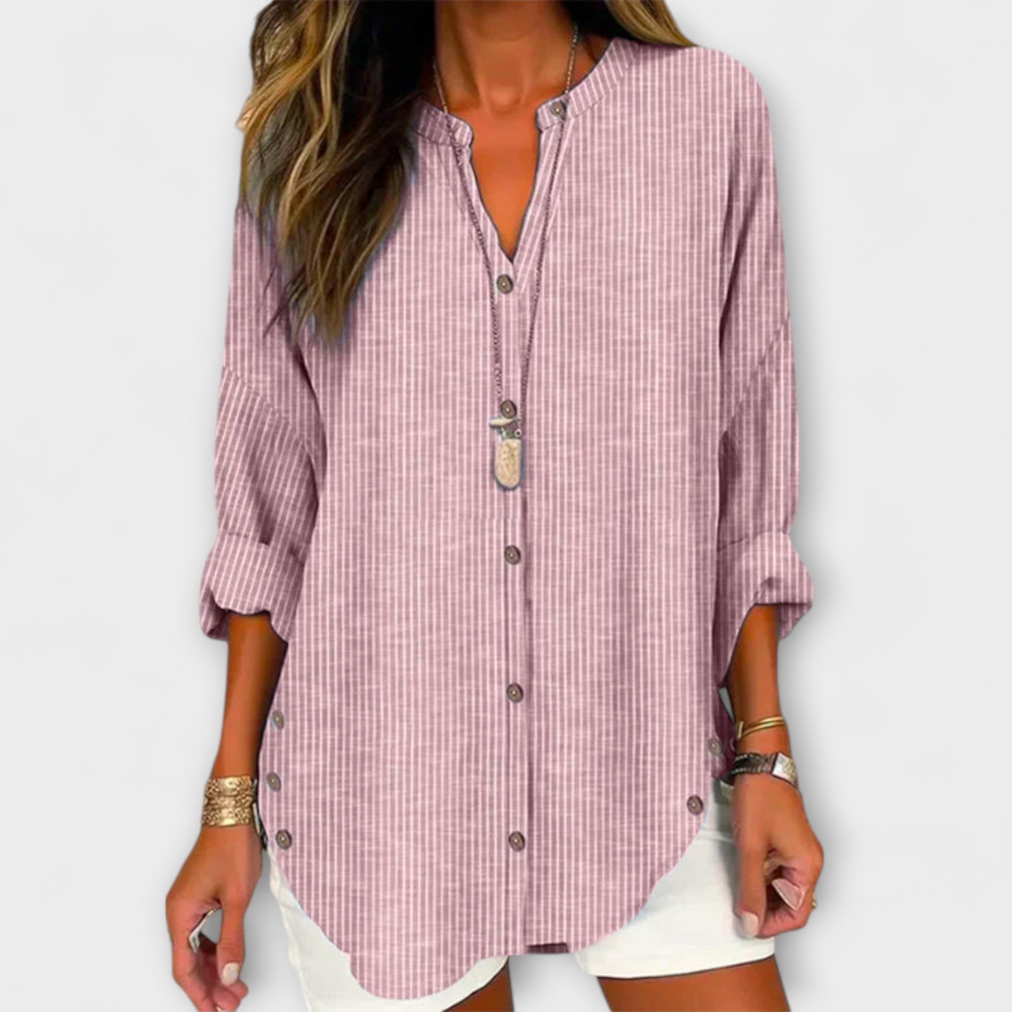 Kerstin | Elegante top con scollo a V e classico motivo a righe — 2