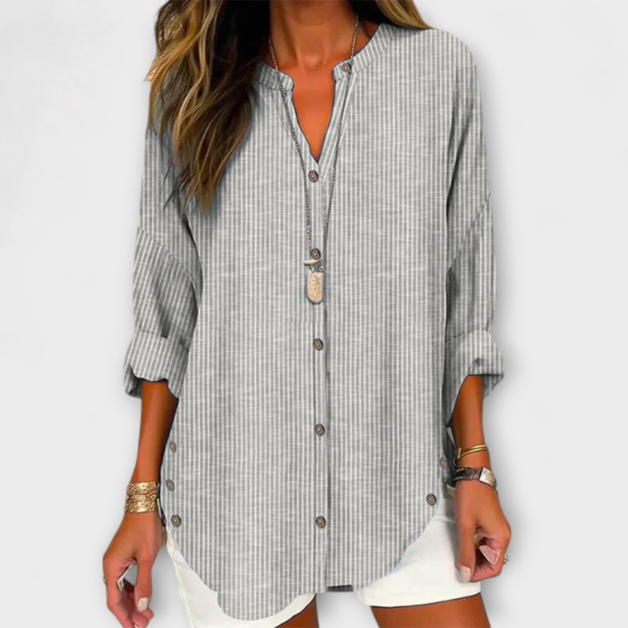 Kerstin | Elegante top con scollo a V e classico motivo a righe — 3
