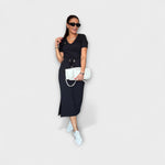 Viktoria | Top elegante con scollo a V e gonna — 1
