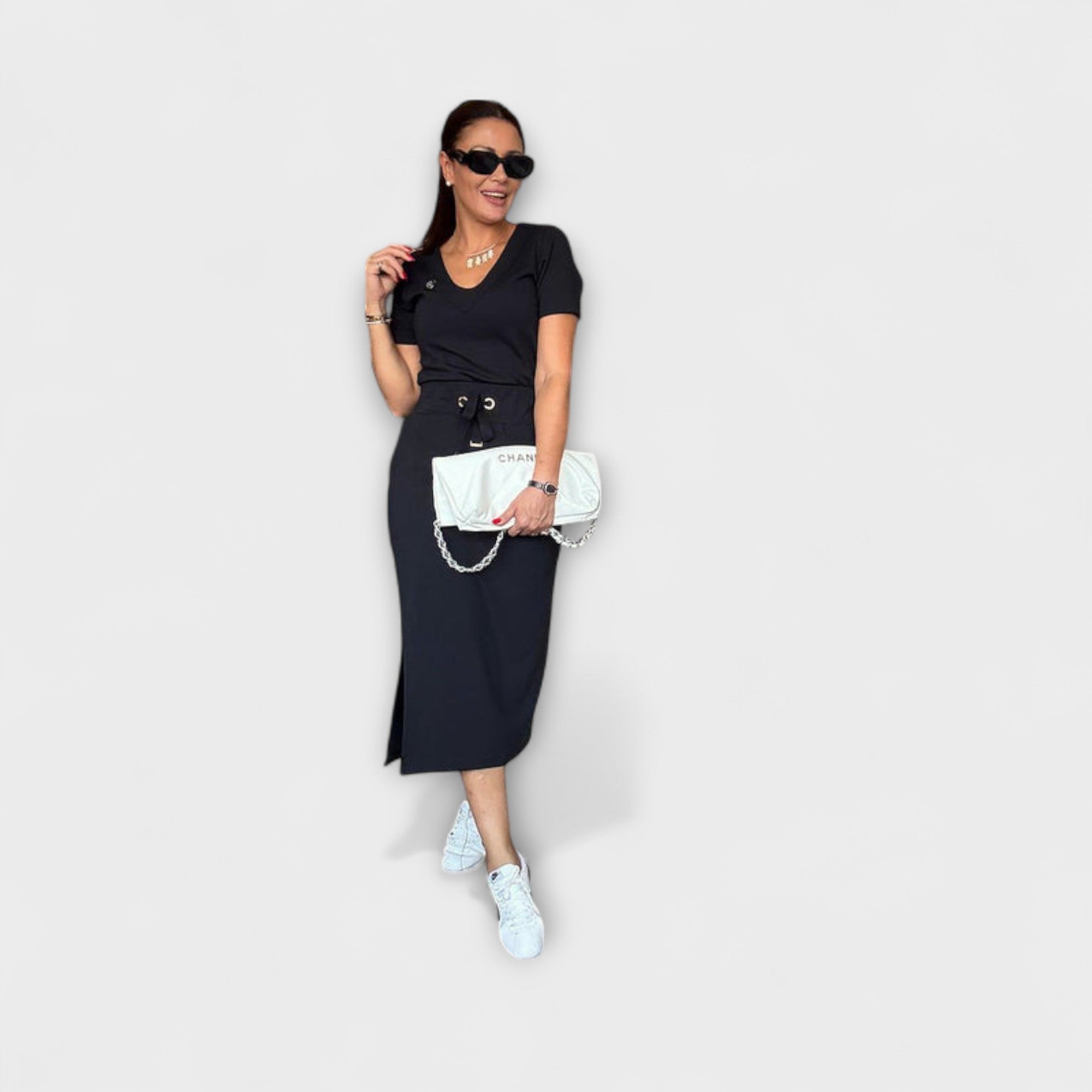 Viktoria | Top elegante con scollo a V e gonna — 1
