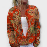 Bärbel | Cardigan lavorato a maglia con charm floreale — 1