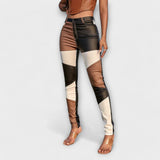 Valerie | Pantaloni skinny con motivo color block — 1