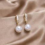 Birgit | Orecchini eleganti con accenti di perle — 1
