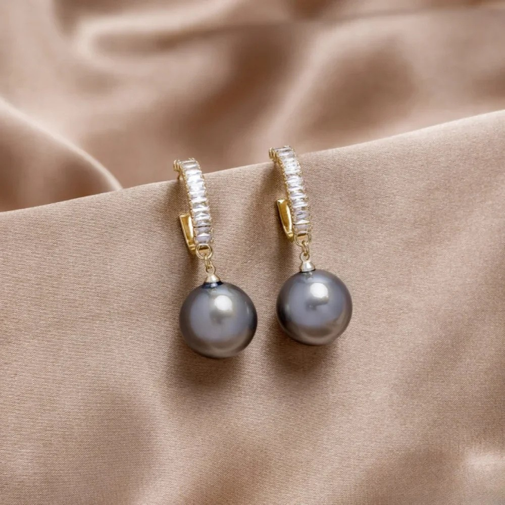 Birgit | Orecchini eleganti con accenti di perle — 2