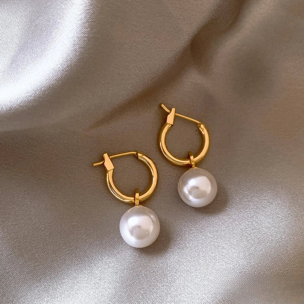 Lara | Eleganti orecchini con perle dorate — 1
