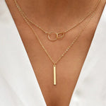 Linda | Collana retrò color oro con pendente a doppio cerchio — 1