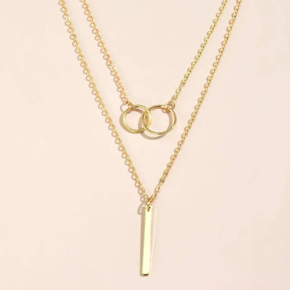 Linda | Collana retrò color oro con pendente a doppio cerchio — 2