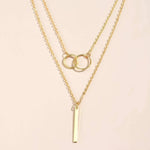 Linda | Collana retrò color oro con pendente a doppio cerchio — 2