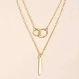 Linda | Collana retrò color oro con pendente a doppio cerchio — 2