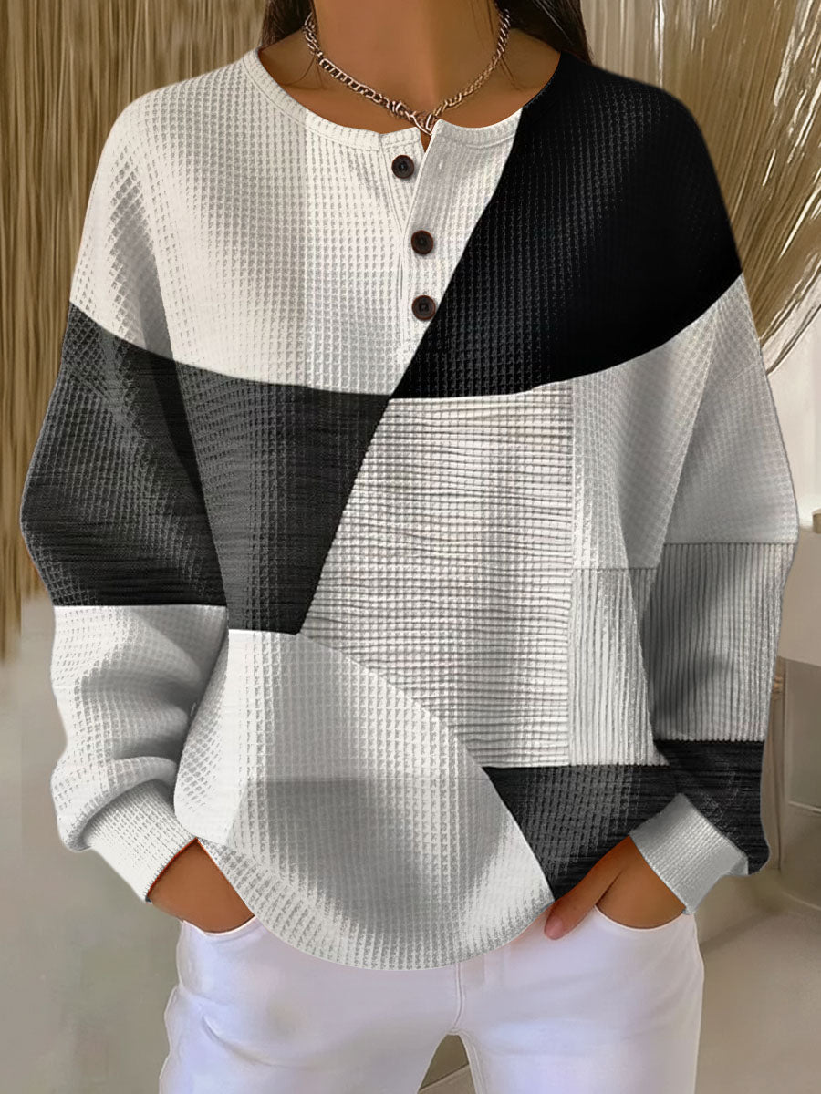 Greta | Maglione con struttura waffle e blocchi di colore — 1