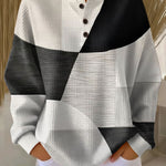 Greta | Maglione con struttura waffle e blocchi di colore — 1