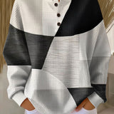 Greta | Maglione con struttura waffle e blocchi di colore — 1